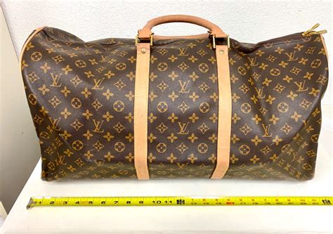 lv duffle bag fake|louis vuitton duffle bag 65.